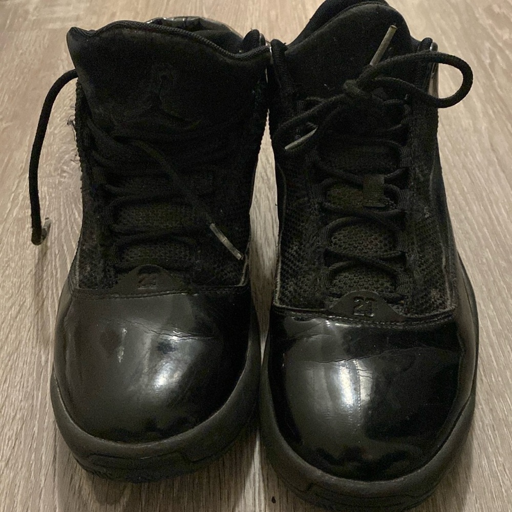 Jordan size 8 black patent leather in used condition